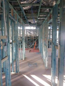 A steel building frame | Featured image for the Load Bearing Walls blog article from ASBIR.